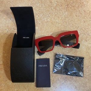 New without tags, never worn Prada sunglasses.
